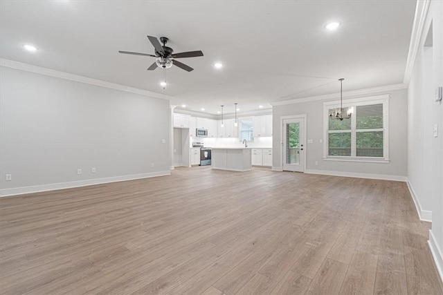 7 Mcginnis Ln, Bella Vista, AR 72715 - unfurnished living room with a ceiling fan, light wood-style flooring, ornamental molding, baseboards, and recessed lighting
