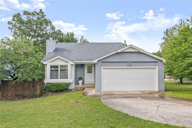 1137 E Township St, Fayetteville, AR 72703 - single story home featuring driveway, a chimney, a garage, a shingled roof, and brick siding