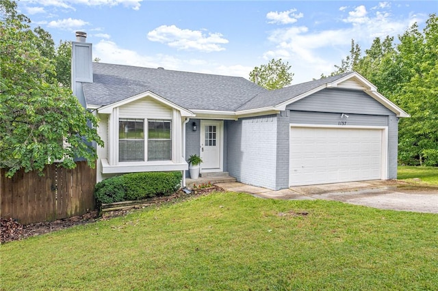 1137 E Township St, Fayetteville, AR 72703 - ranch-style home featuring concrete driveway, an attached garage, a chimney, roof with shingles, and entry steps