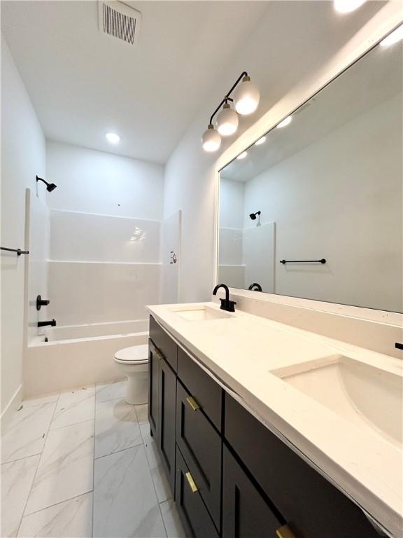 1 Consett Ln, Bella Vista, AR 72714 - full bath with double vanity, shower / bathtub combination, recessed lighting, and marble finish flooring