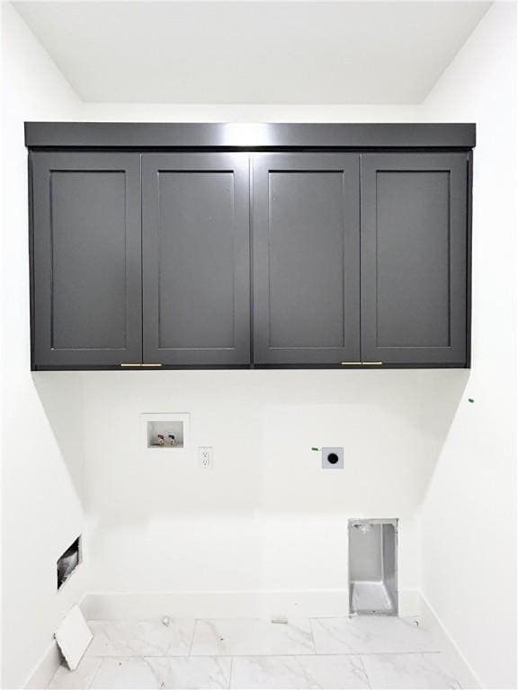 1 Consett Ln, Bella Vista, AR 72714 - laundry room featuring electric dryer hookup, cabinet space, marble look tile flooring, and washer hookup