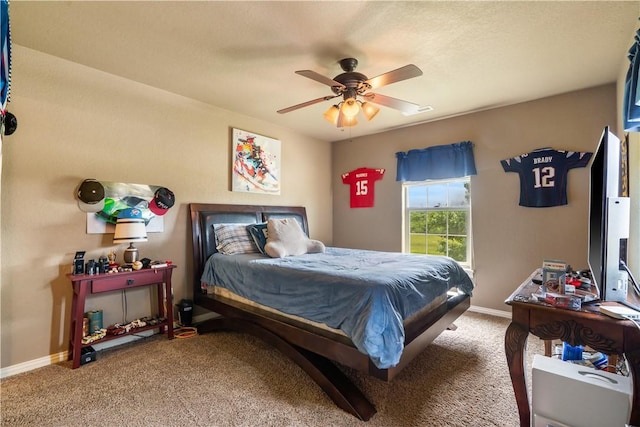14453 Merritt Dr, Pea Ridge, AR 72751 - bedroom with carpet floors, baseboards, and a ceiling fan