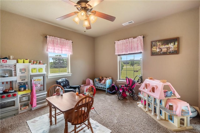 14453 Merritt Dr, Pea Ridge, AR 72751 - recreation room with carpet flooring, healthy amount of natural light, and ceiling fan