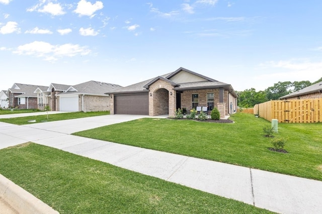 1431 Ari Ave, Centerton, AR 72719 - ranch-style home featuring driveway, brick siding, and a garage