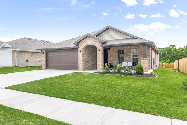 1431 Ari Ave, Centerton, AR 72719 - view of front of property featuring an attached garage, concrete driveway, brick siding, and a shingled roof