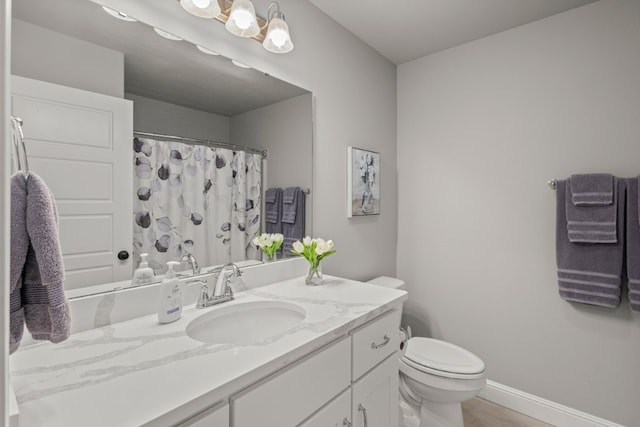 1431 Ari Ave, Centerton, AR 72719 - bathroom with vanity, toilet, baseboards, a shower with shower curtain, and wood finished floors