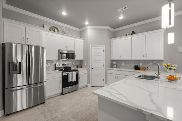 1431 Ari Ave, Centerton, AR 72719 - kitchen with stainless steel appliances, a sink, white cabinets, tasteful backsplash, and crown molding