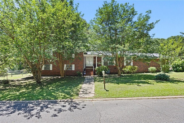 711 W 18th Ter, Russellville, AR 72801 - view of front facade featuring brick siding