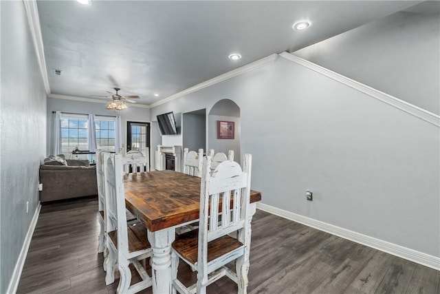 904 S Lafayette St, Rogers, AR 72758 - dining area featuring baseboards, ceiling fan, arched walkways, wood finished floors, and recessed lighting