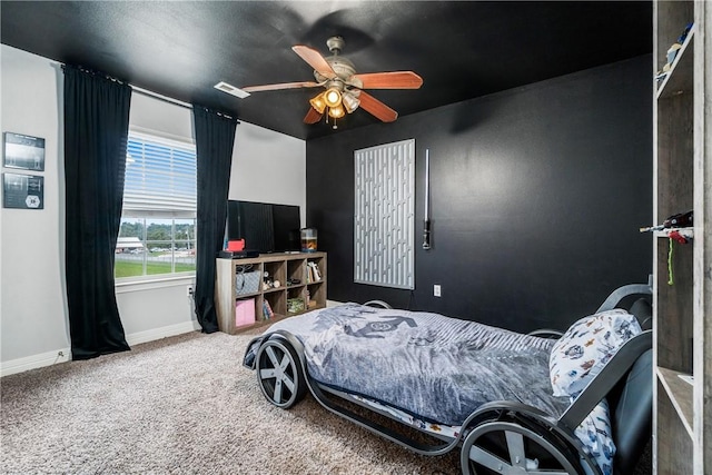 904 S Lafayette St, Rogers, AR 72758 - carpeted bedroom with baseboards and ceiling fan