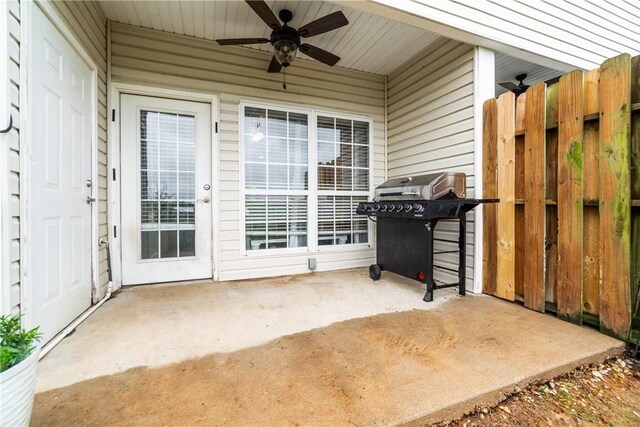 904 S Lafayette St, Rogers, AR 72758 - view of patio featuring a ceiling fan and a grill
