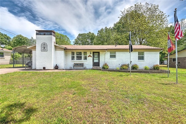 1330 S Baldwin Ave, Fayetteville, AR 72701 - view of front of home featuring a chimney, a carport, and brick siding