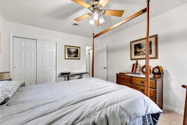 1330 S Baldwin Ave, Fayetteville, AR 72701 - bedroom with carpet flooring, a closet, a ceiling fan, and baseboards