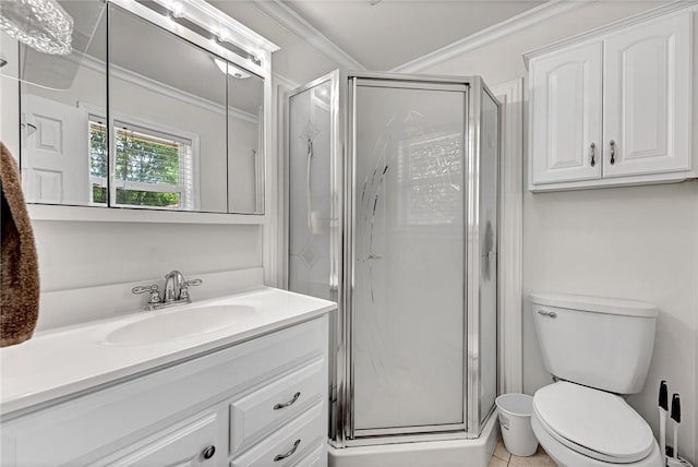 1330 S Baldwin Ave, Fayetteville, AR 72701 - full bath featuring vanity, a stall shower, toilet, crown molding, and tile patterned floors