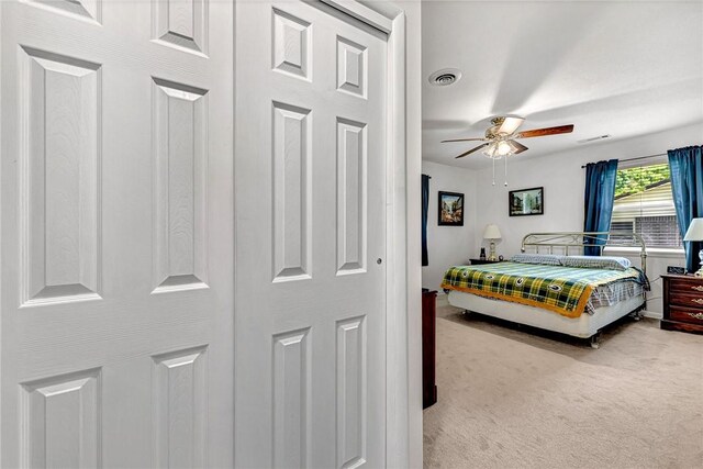 1330 S Baldwin Ave, Fayetteville, AR 72701 - carpeted bedroom featuring a ceiling fan