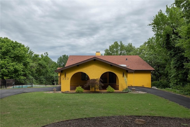 363 E Ralston St, Farmington, AR 72730 - view of front facade featuring driveway and stucco siding