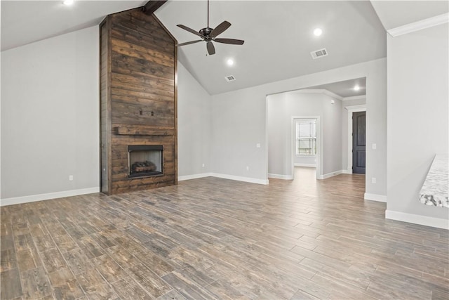 1440 Amber Way, Centerton, AR 72719 - unfurnished living room featuring a ceiling fan, wood finished floors, a fireplace, baseboards, and high vaulted ceiling