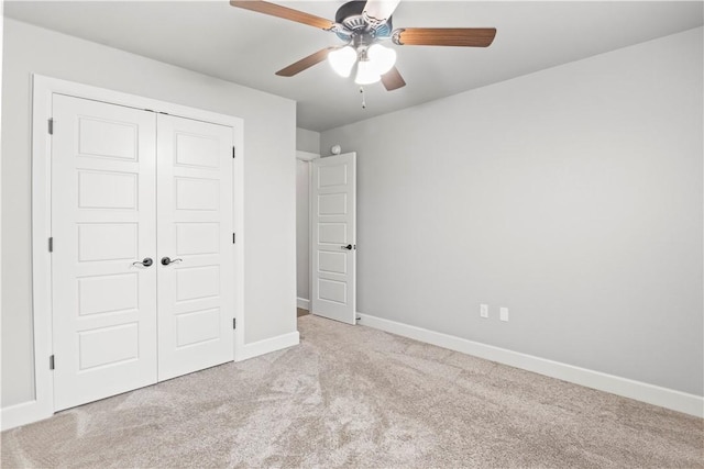 1440 Amber Way, Centerton, AR 72719 - unfurnished bedroom with carpet floors, a closet, baseboards, and ceiling fan