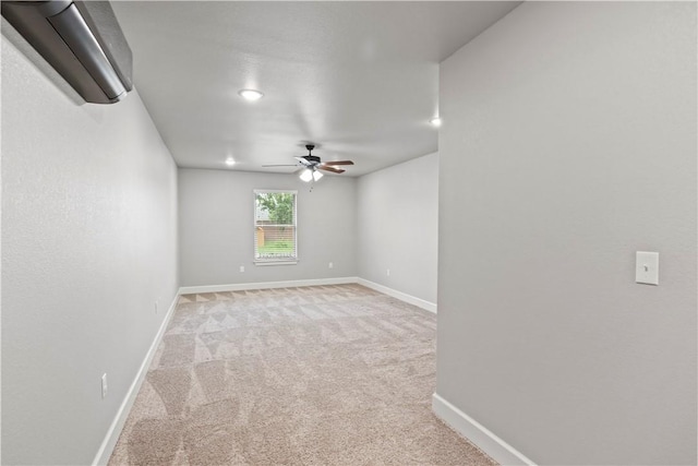 1440 Amber Way, Centerton, AR 72719 - spare room with a ceiling fan, light carpet, baseboards, a wall mounted air conditioner, and recessed lighting