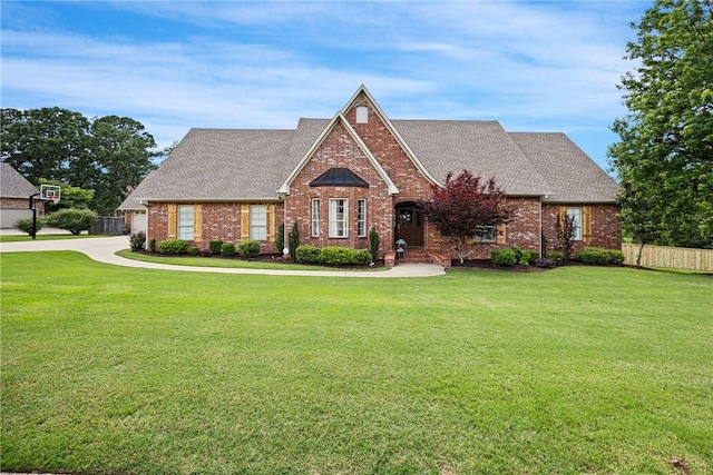 306 Osage Ct, Russellville, AR 72802 - view of front facade with brick siding and a shingled roof