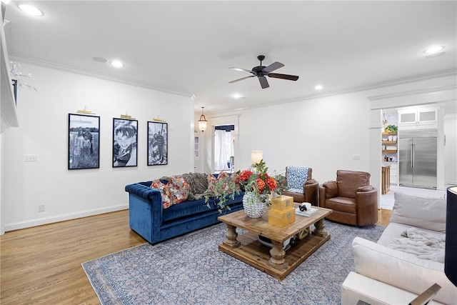 306 Osage Ct, Russellville, AR 72802 - living area featuring crown molding, wood finished floors, a ceiling fan, recessed lighting, and baseboards