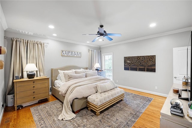 306 Osage Ct, Russellville, AR 72802 - bedroom featuring crown molding, light wood-style floors, recessed lighting, ceiling fan, and baseboards