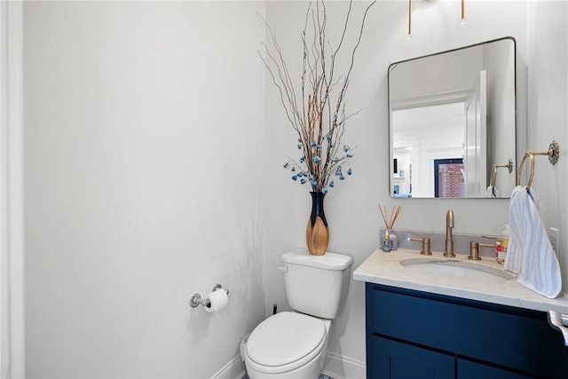 306 Osage Ct, Russellville, AR 72802 - half bath featuring toilet, vanity, and baseboards