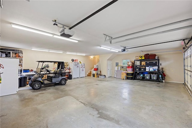 306 Osage Ct, Russellville, AR 72802 - garage with a garage door opener