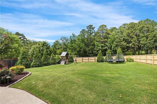 306 Osage Ct, Russellville, AR 72802 - view of yard with a trampoline and a playground