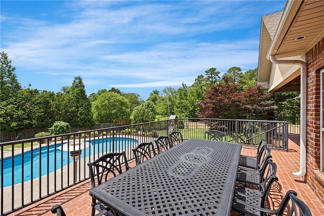 306 Osage Ct, Russellville, AR 72802 - fenced backyard featuring outdoor dining area, a patio area, and view of wooded area