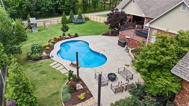 306 Osage Ct, Russellville, AR 72802 - view of swimming pool with a patio area, a playground, and a trampoline
