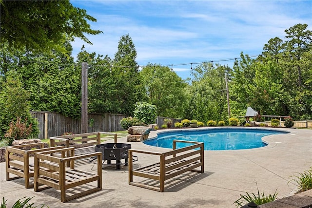 306 Osage Ct, Russellville, AR 72802 - view of pool with an outdoor fire pit, a patio area, and a fenced backyard