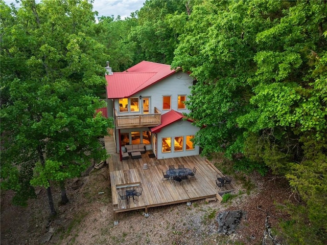 9151 Bay Ridge Ln, Garfield, AR 72732 - rear view of house with a balcony, a wooden deck, and metal roof