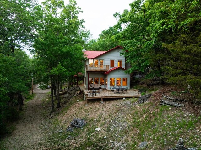 9151 Bay Ridge Ln, Garfield, AR 72732 - rear view of house featuring a deck and a balcony