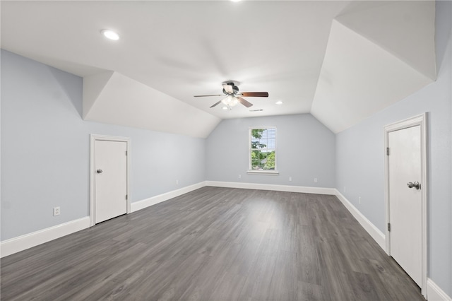 600 Rocky Xing, Fayetteville, AR 72704 - additional living space with a ceiling fan, baseboards, dark wood-style floors, vaulted ceiling, and recessed lighting