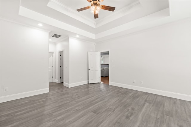 600 Rocky Xing, Fayetteville, AR 72704 - unfurnished room featuring crown molding, a raised ceiling, ceiling fan, recessed lighting, and wood finished floors