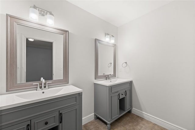 600 Rocky Xing, Fayetteville, AR 72704 - bathroom with baseboards, vanity, and tile patterned floors