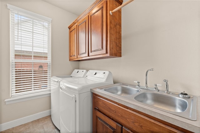 600 Rocky Xing, Fayetteville, AR 72704 - laundry area with washer and dryer, baseboards, cabinet space, and light tile patterned floors