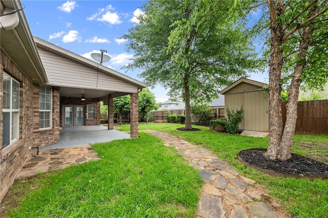 600 Rocky Xing, Fayetteville, AR 72704 - view of yard with a patio area, ceiling fan, and french doors
