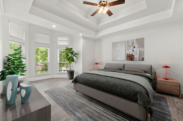 600 Rocky Xing, Fayetteville, AR 72704 - bedroom with a raised ceiling, light wood-style floors, crown molding, recessed lighting, and a ceiling fan