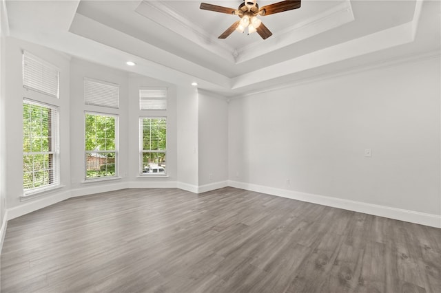 600 Rocky Xing, Fayetteville, AR 72704 - empty room with a raised ceiling, ceiling fan, wood finished floors, crown molding, and recessed lighting