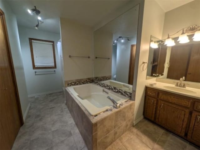 208 Mc 6087, Yellville, AR 72687 - bathroom featuring a garden tub, vanity, tile patterned flooring, and baseboards