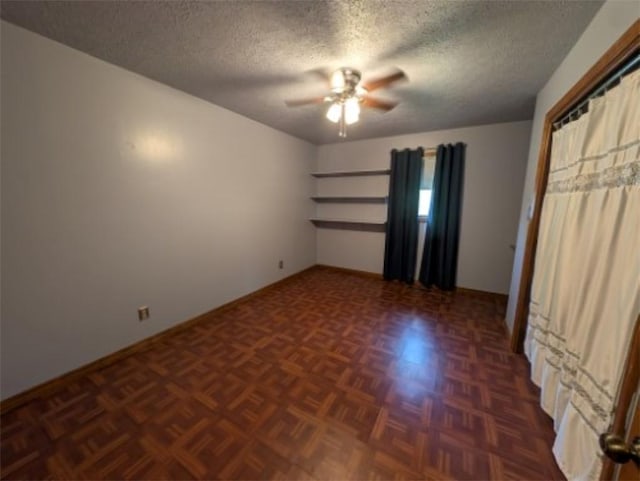 208 Mc 6087, Yellville, AR 72687 - unfurnished room featuring ceiling fan, a textured ceiling, and baseboards