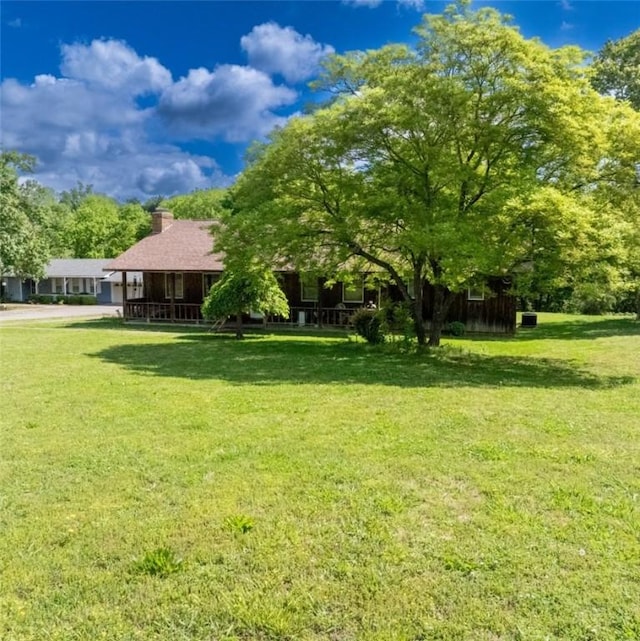 208 Mc 6087, Yellville, AR 72687 - view of grassy yard featuring a porch