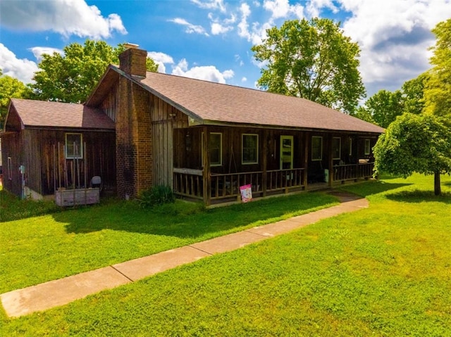 208 Mc 6087, Yellville, AR 72687 - view of front of property with a front lawn and a chimney