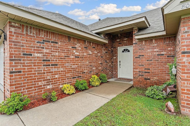 801 SW Castlewood St, Bentonville, AR 72712 - property entrance featuring brick siding and roof with shingles
