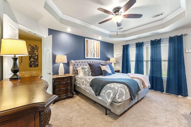 801 SW Castlewood St, Bentonville, AR 72712 - bedroom featuring a raised ceiling, ornamental molding, light carpet, and ceiling fan