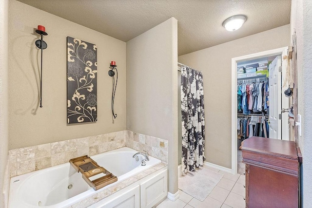 801 SW Castlewood St, Bentonville, AR 72712 - full bath with a jetted tub, tile patterned flooring, a shower with shower curtain, and a textured ceiling