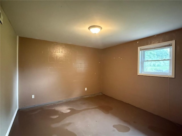 1902 W Granite St, Siloam Springs, AR 72761 - spare room featuring unfinished concrete floors