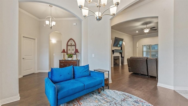 809 Ravine St, Cave Springs, AR 72718 - sitting room with arched walkways, ceiling fan, wood finished floors, a chandelier, and crown molding